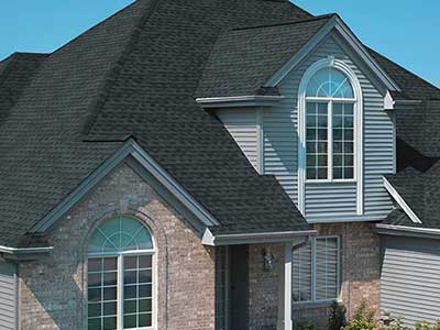 Home with black GAF shingles on its roof